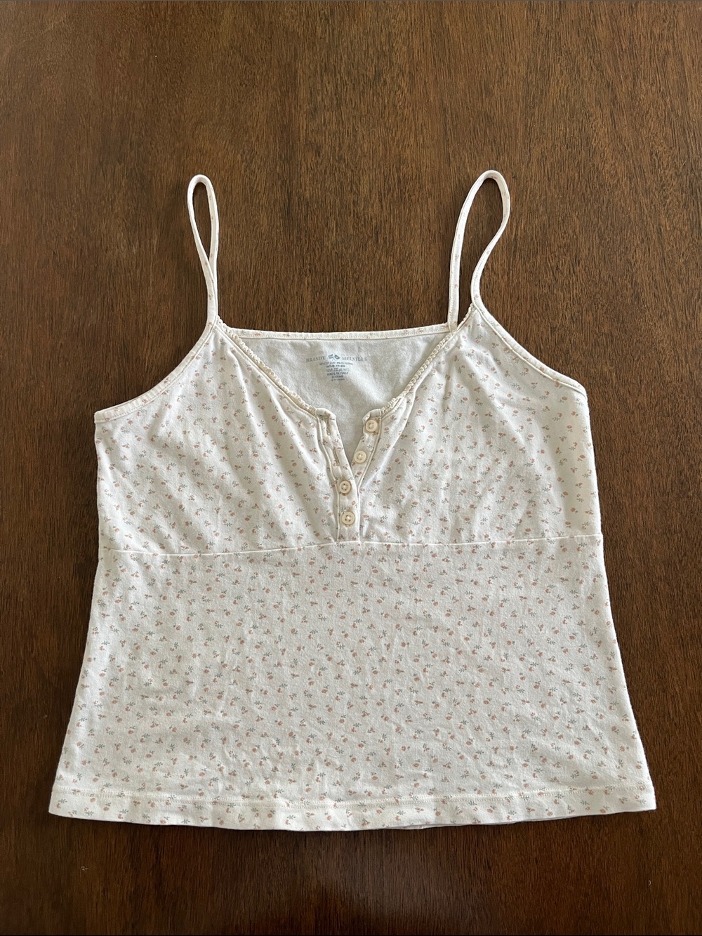 Brandy Melville cream and pink floral tank top with lace and buttons